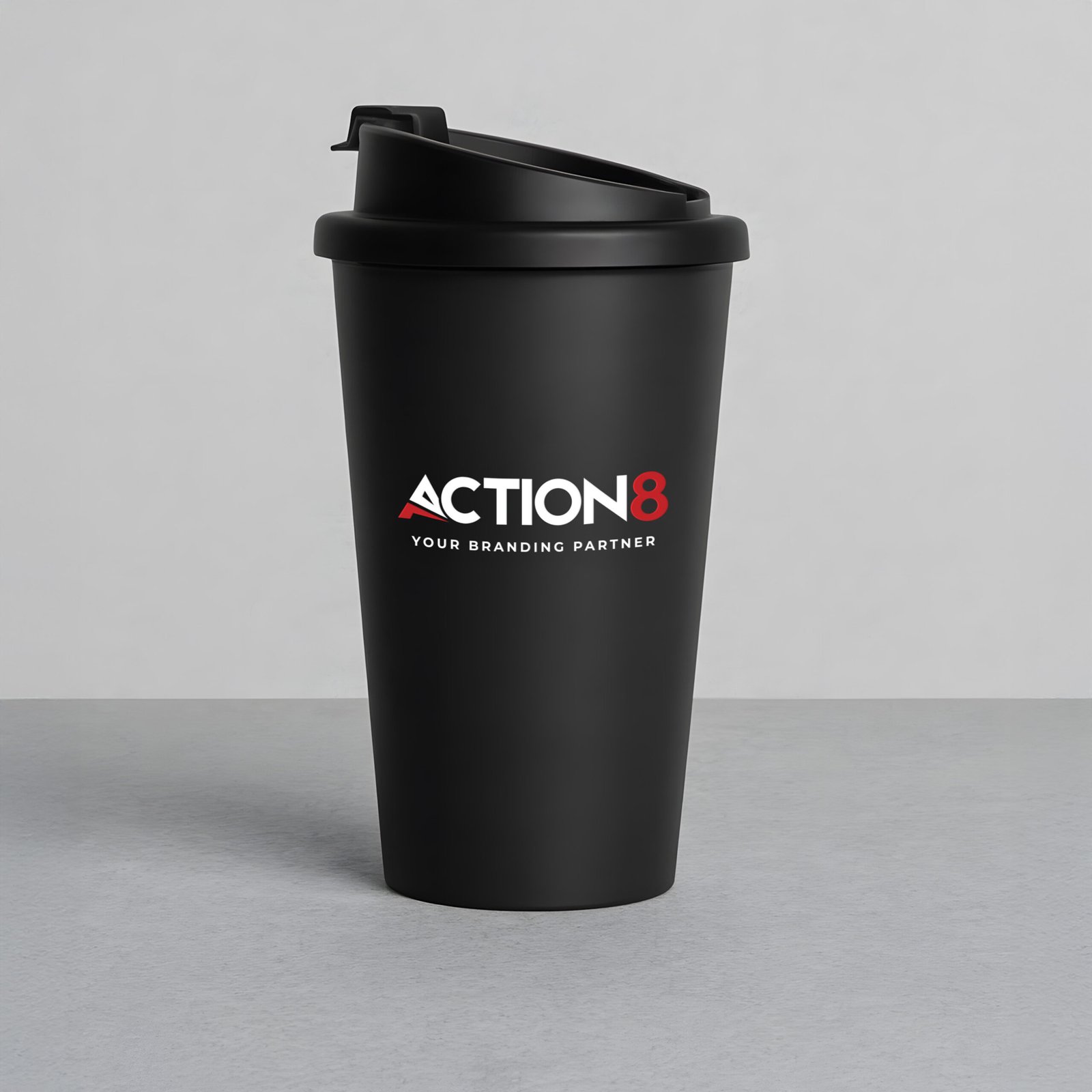 Black branded thermal mug featuring the Action8 logo and tagline "Your Branding Partner."